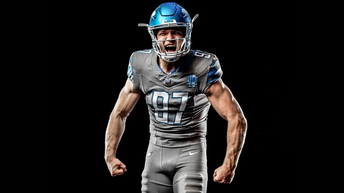 Former Michigan Football Star Aidan Hutchinson Models New Detroit Lions 