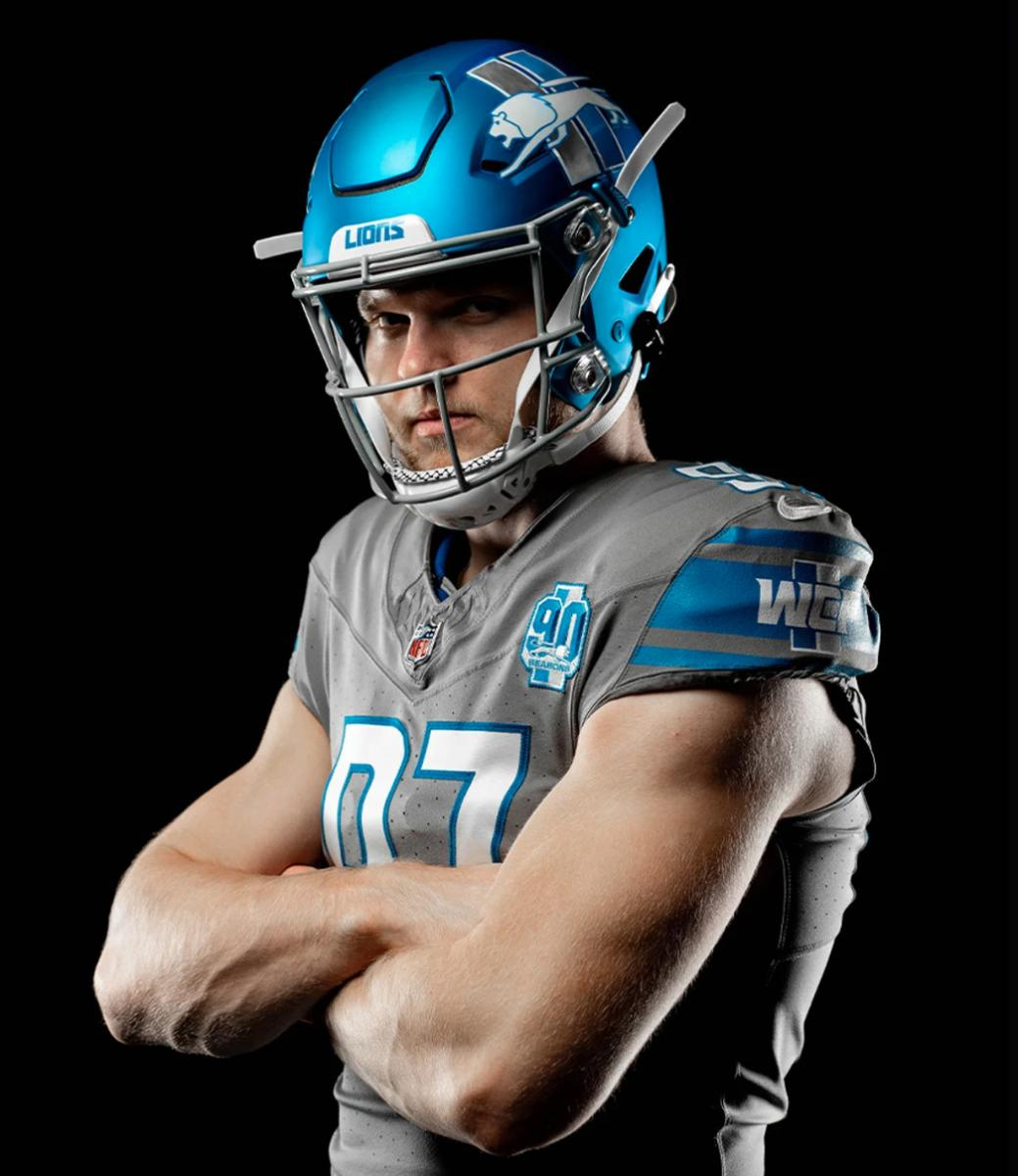 Former Michigan Football Star Aidan Hutchinson Models New Detroit Lions 