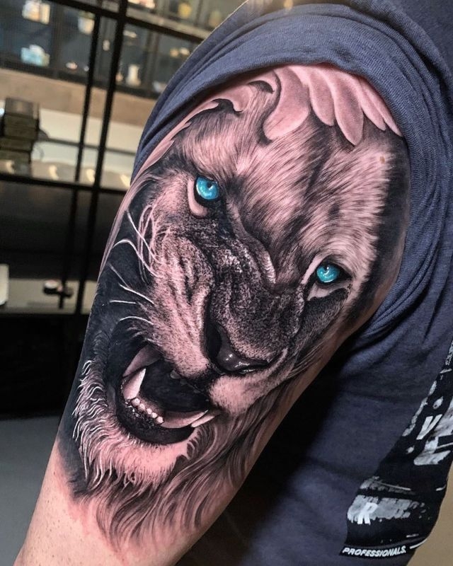 Unveiling The Symbolic Power Lion With Blue Eyes Tattoo Meaning Explored